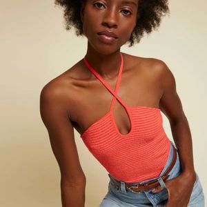 70s inspired keyhole halter top that’s fully smocked for extra support.
